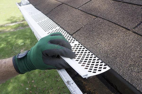 gutter guards act as a barrier to prevent leaves, debris, and twigs from clogging the gutters